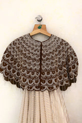 Cream Soft Organza Silk Weaving Stripe Saree with Poncho Blouse and Cutdana Work Scallop Border